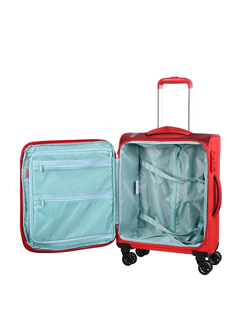 American Tourister red Marina Suitcase, Cabin Size 57 cm, 4 Spinner Wheels, Soft Top, 100% Polyester, Red|Inner Mesh Zippered Pocket|Expandable|TSA Lock|Voluminous Front Pocket - 3 Years International Warranty  | Best Price UAE